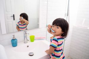 child with fluoride